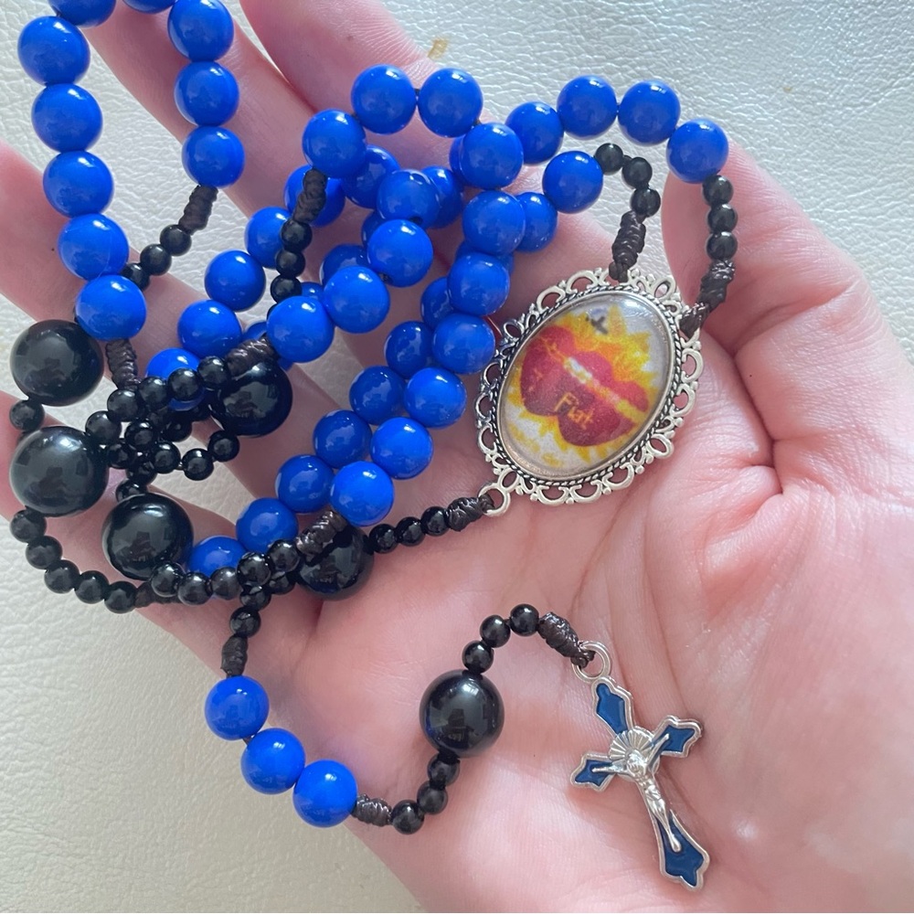 Vibrant Blue and Black Beaded Necklace with Silver Cross